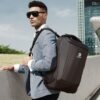 Stylish business laptop bag & school backpack for teens, durable and spacious design.
